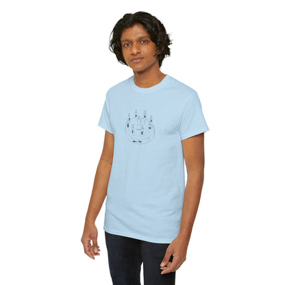 Person wearing a light blue t-shirt with a graphic design on a white background